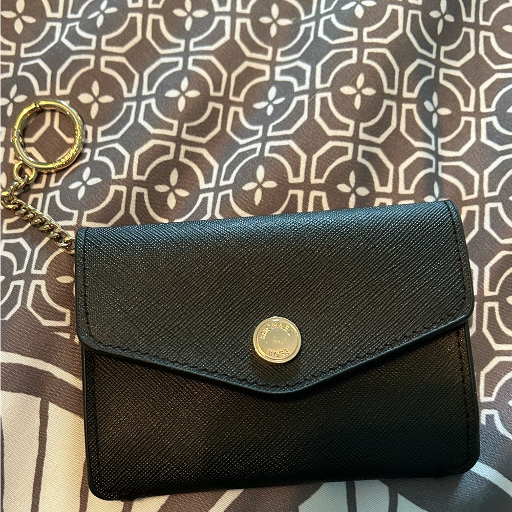 Michael Kors change purse never used excellet condition